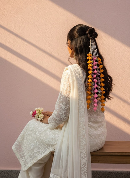 Lily bohemian hair accessory with colorful crochet tassels in orange, pink, purple, white beads, and silver bells.