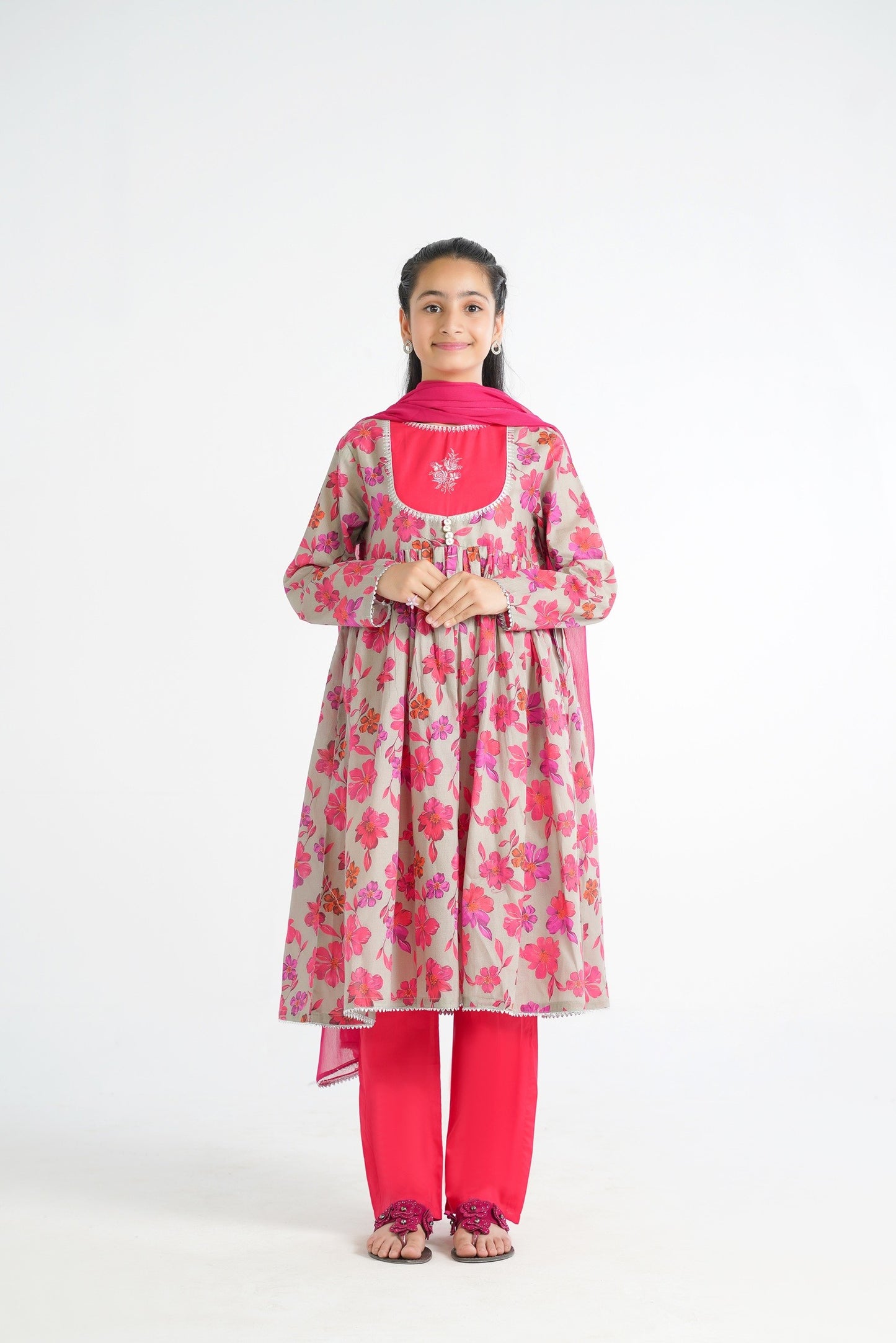 Lily grey kurta with pink floral print, hot pink yoke, embroidery, and silver trim. Paired with hot pink pants and dupatta.