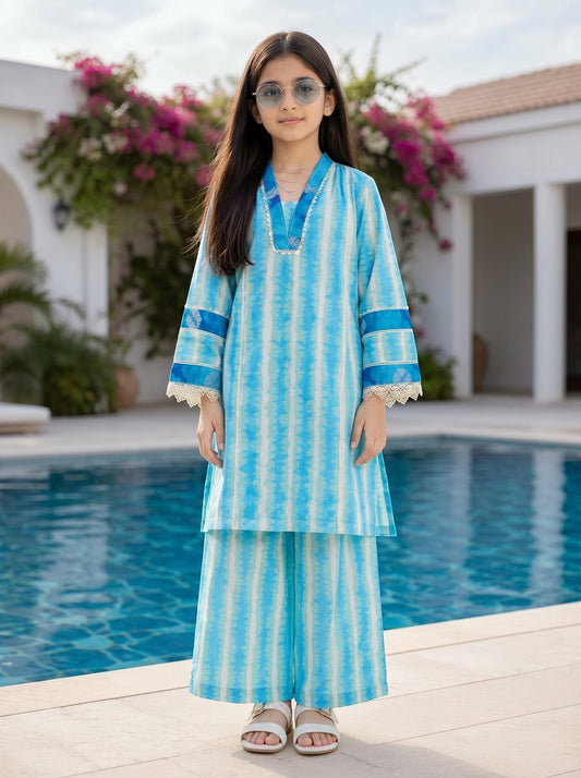 Lily girls blue and white tie-dye kurta set with V-neck, lace trim, and wide-leg trousers worn by a young girl outdoors.