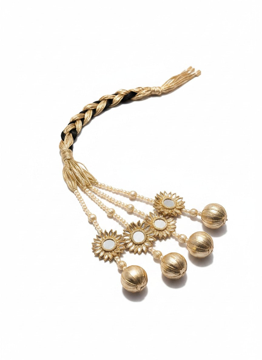 Lily gold braided hair accessory with black threads, pearl beads, mirror embellishments, and dangling spherical tassels.