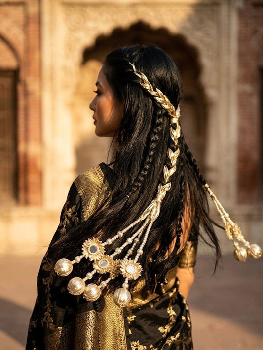 Lily gold braided hair accessory with pearl beads, mirror embellishments, and dangling spherical tassels woven into braids.