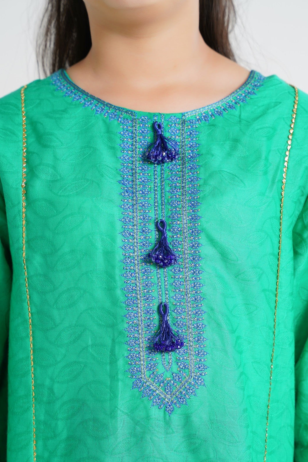 Lily green textured kurta with blue embroidery and tassels, paired with printed pants and dupatta.