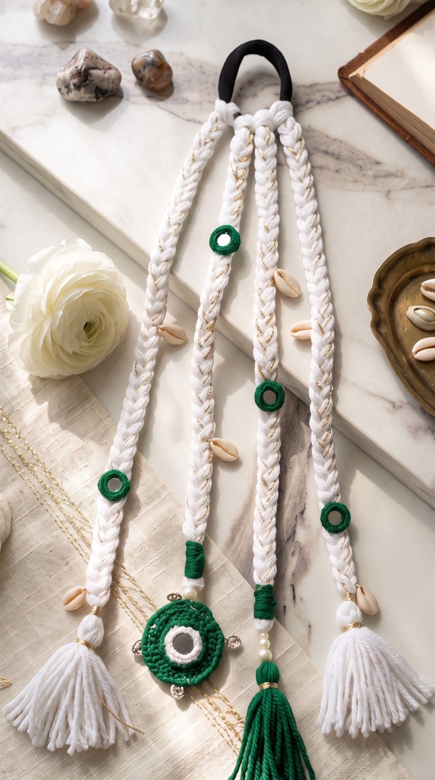 Lily Independence Elegance braided hair accessory in green and white with seashell accents and decorative mirrors.