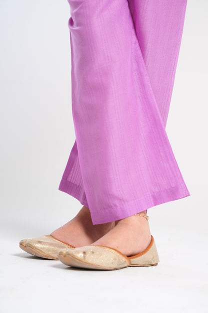 Lily lavender cotton wide-leg pants with subtle vertical stripes and embroidered pineapple motifs.