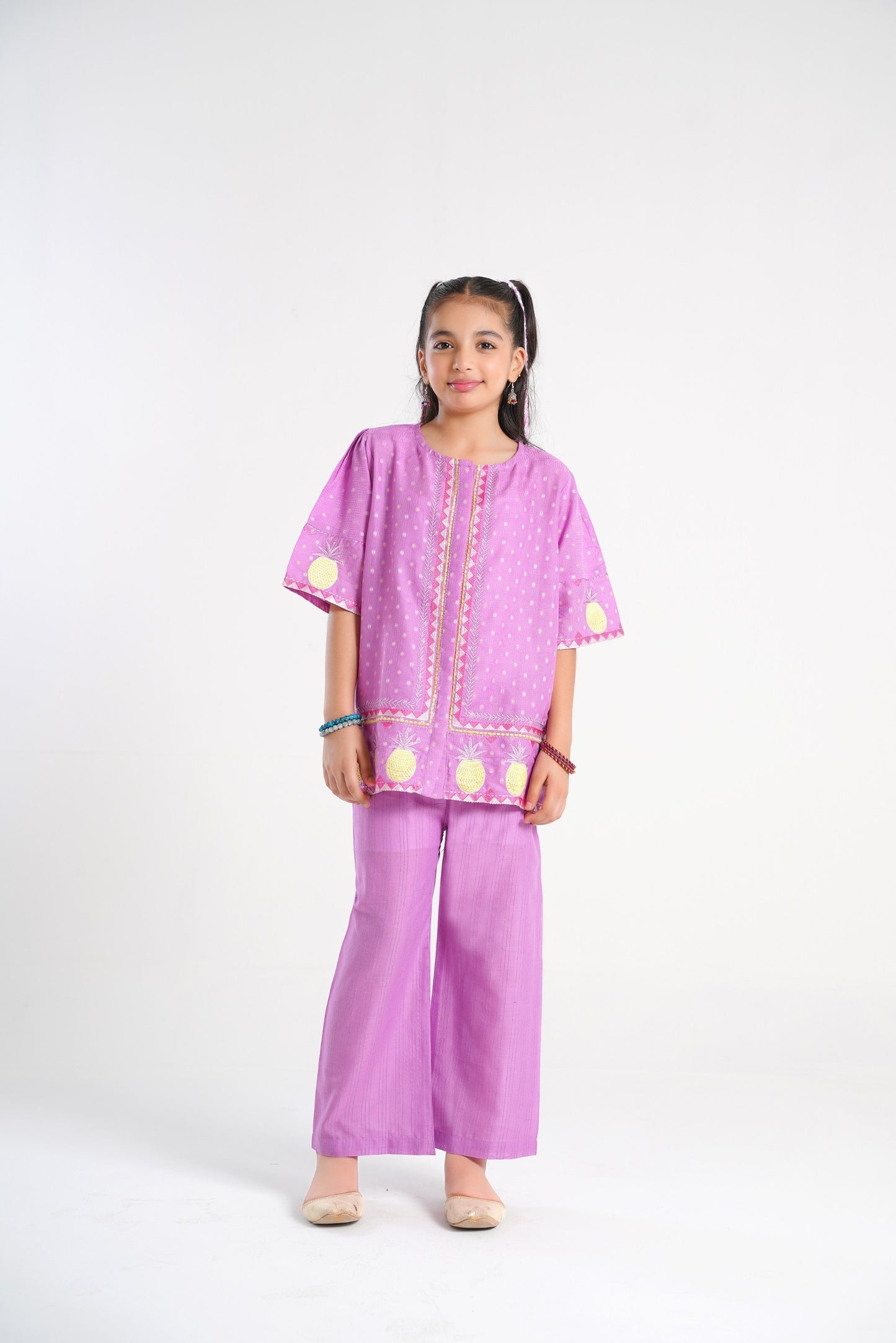 Lily lavender cotton kurta and pants set with polka dot print, embroidered pineapple motifs on sleeves and hem, and wide-leg pants.