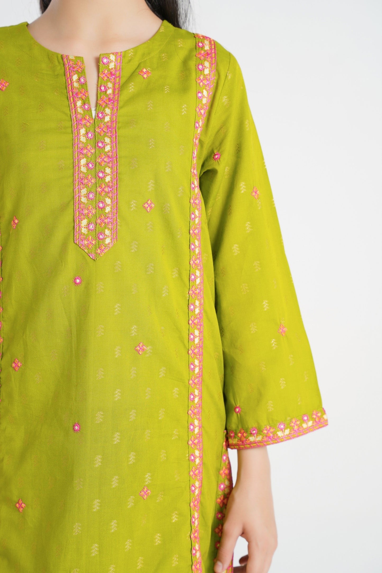 Lily lime green cotton kurta with pink embroidery on neckline and sleeves. Relaxed fit, perfect for kids.