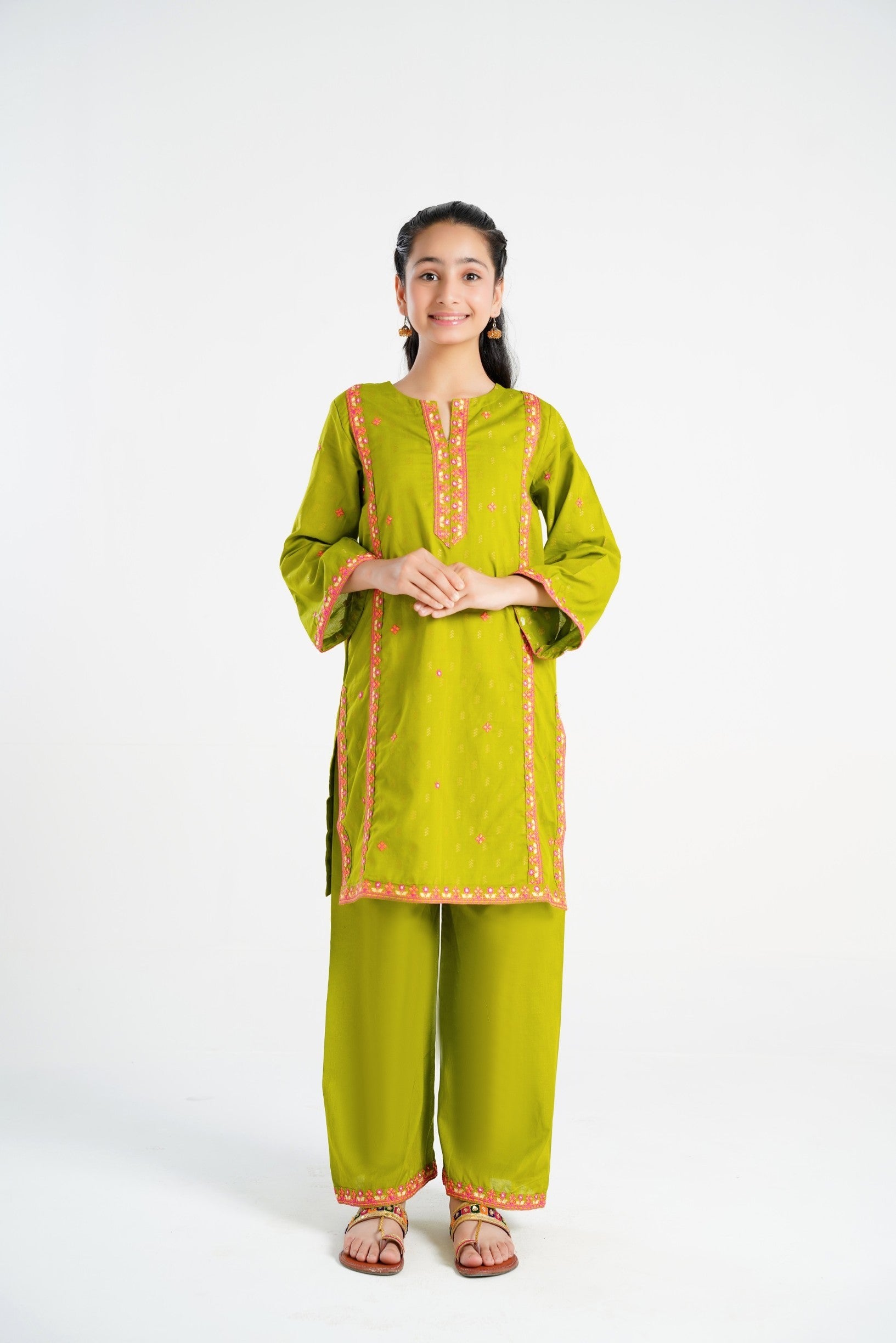 Lily lime green cotton kurta and trouser set with pink embroidery on neckline and sleeves. Relaxed fit, perfect for kids.