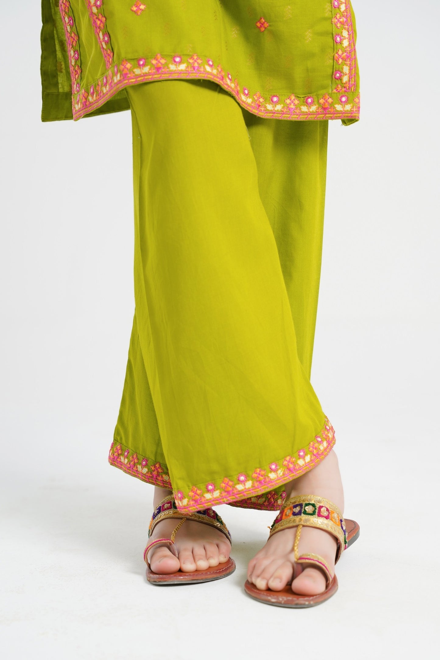 Lily lime green cotton kurta and trouser set with pink embroidery on hem and neckline. Relaxed fit for all-day comfort.