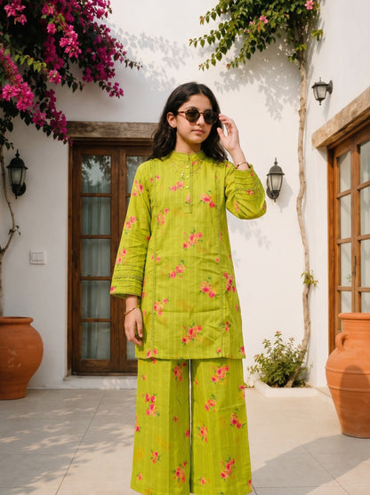 Lily lime green floral print kurta set with lace inserts and wide-leg trousers worn by a woman in sunglasses