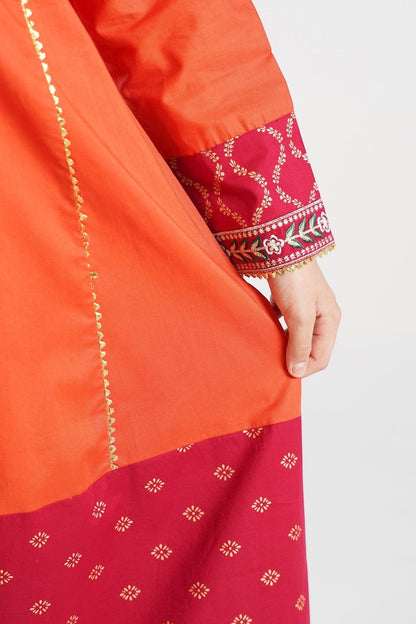 Lily orange embroidered kurta with maroon panels and gold print, paired with matching pants and dupatta.