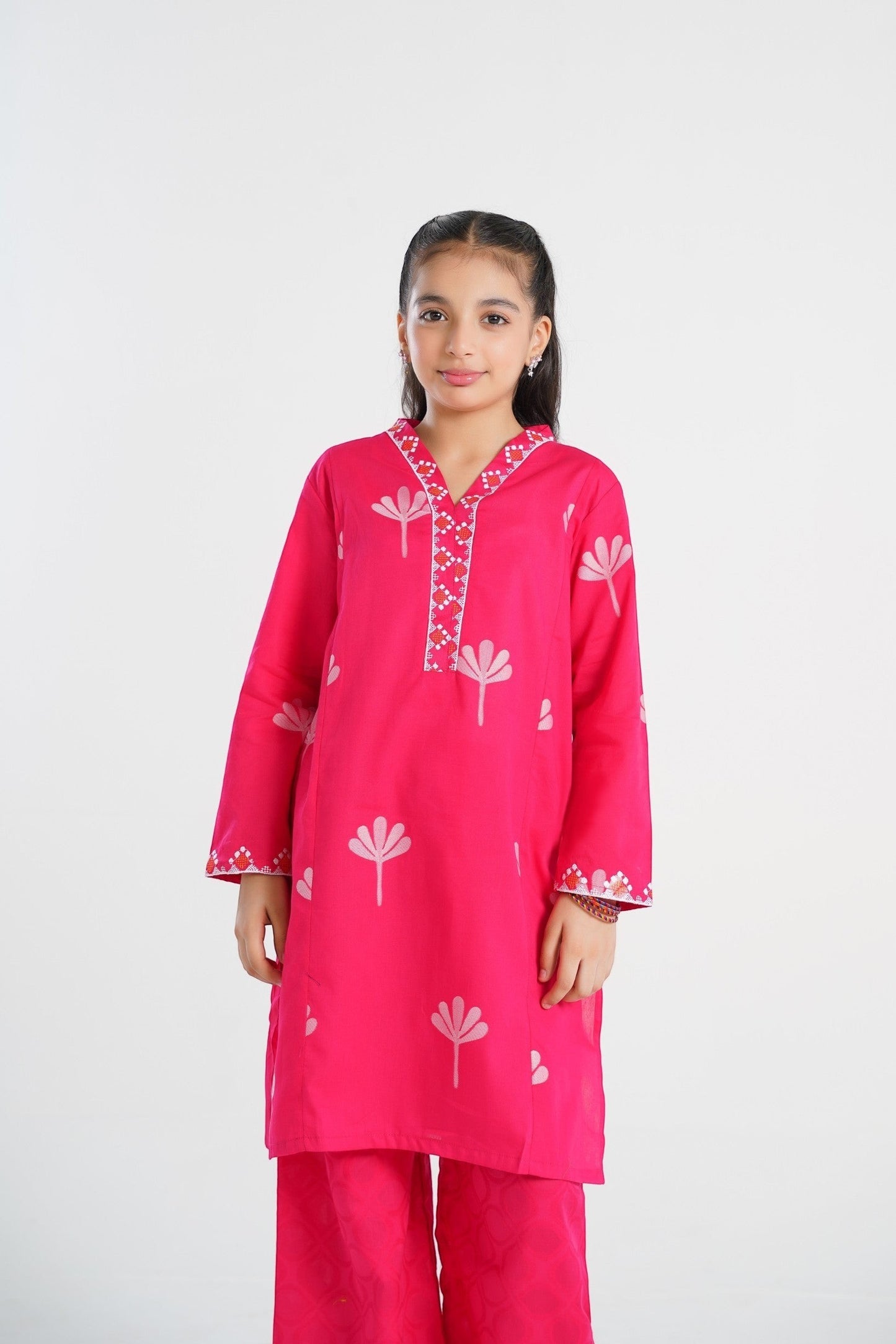 Lily pink cotton kurta with pants, featuring floral print and embroidery. V-neck, full sleeves.