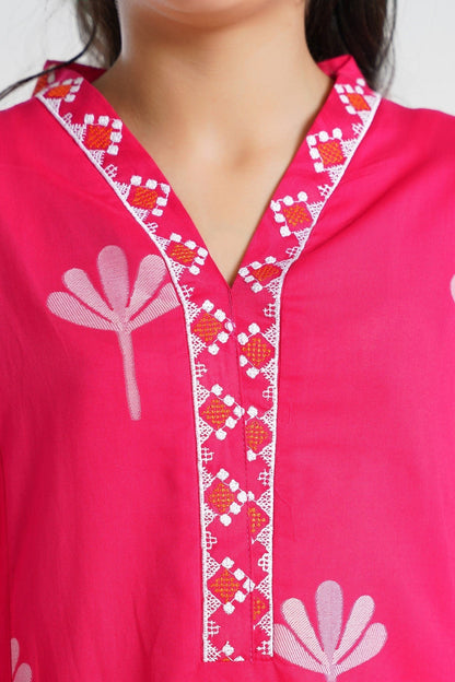 Lily pink cotton kurta with floral print and embroidered V-neckline and cuffs. Perfect for girls.