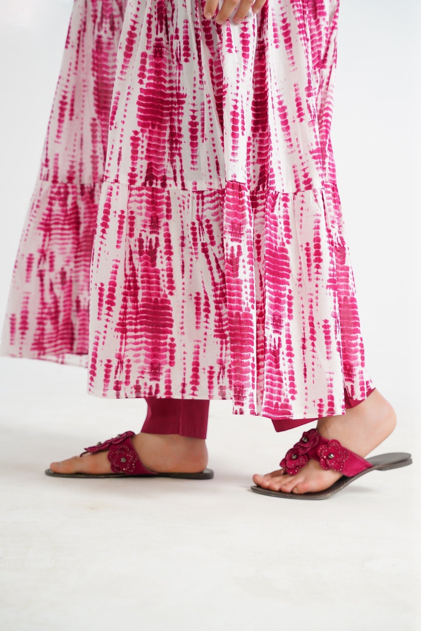 Lily tiered cotton kurta with pink and white tie-dye print, round neckline with embroidery. Perfect for casual or festive wear.