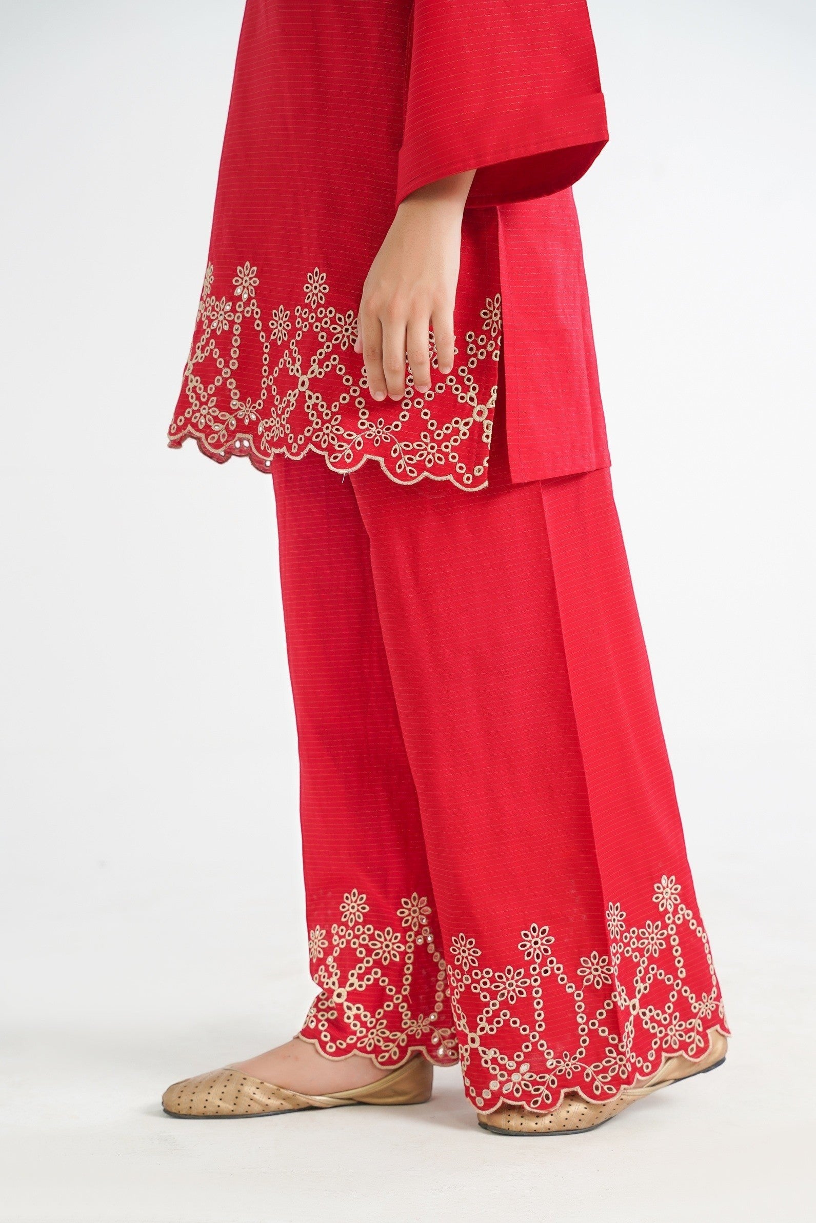 Lily red cotton kurta and palazzo set with floral embroidery on hem. Features bell sleeves and wide-leg pants.