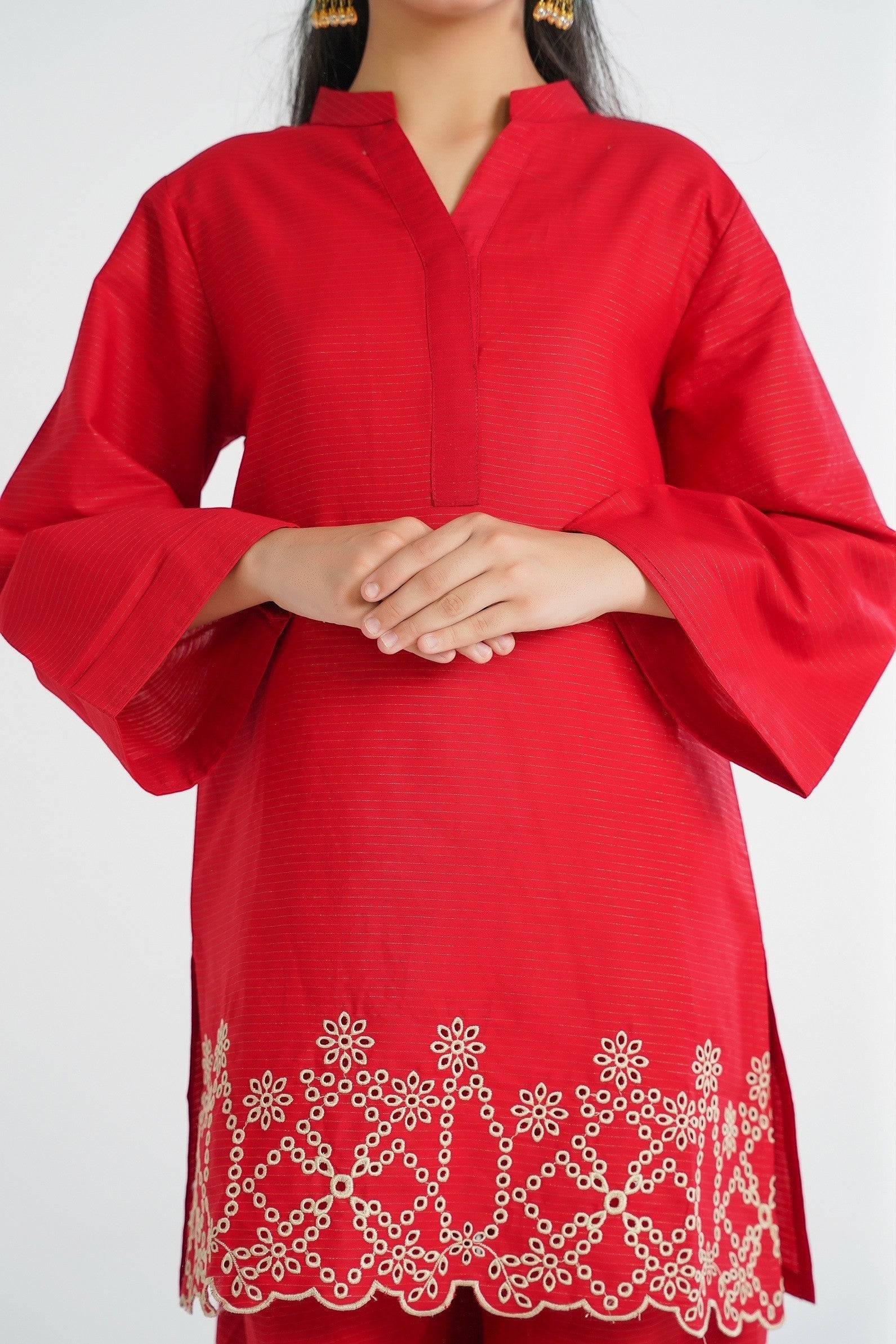 Lily red cotton kurta with bell sleeves and embroidered hem, paired with palazzo pants.