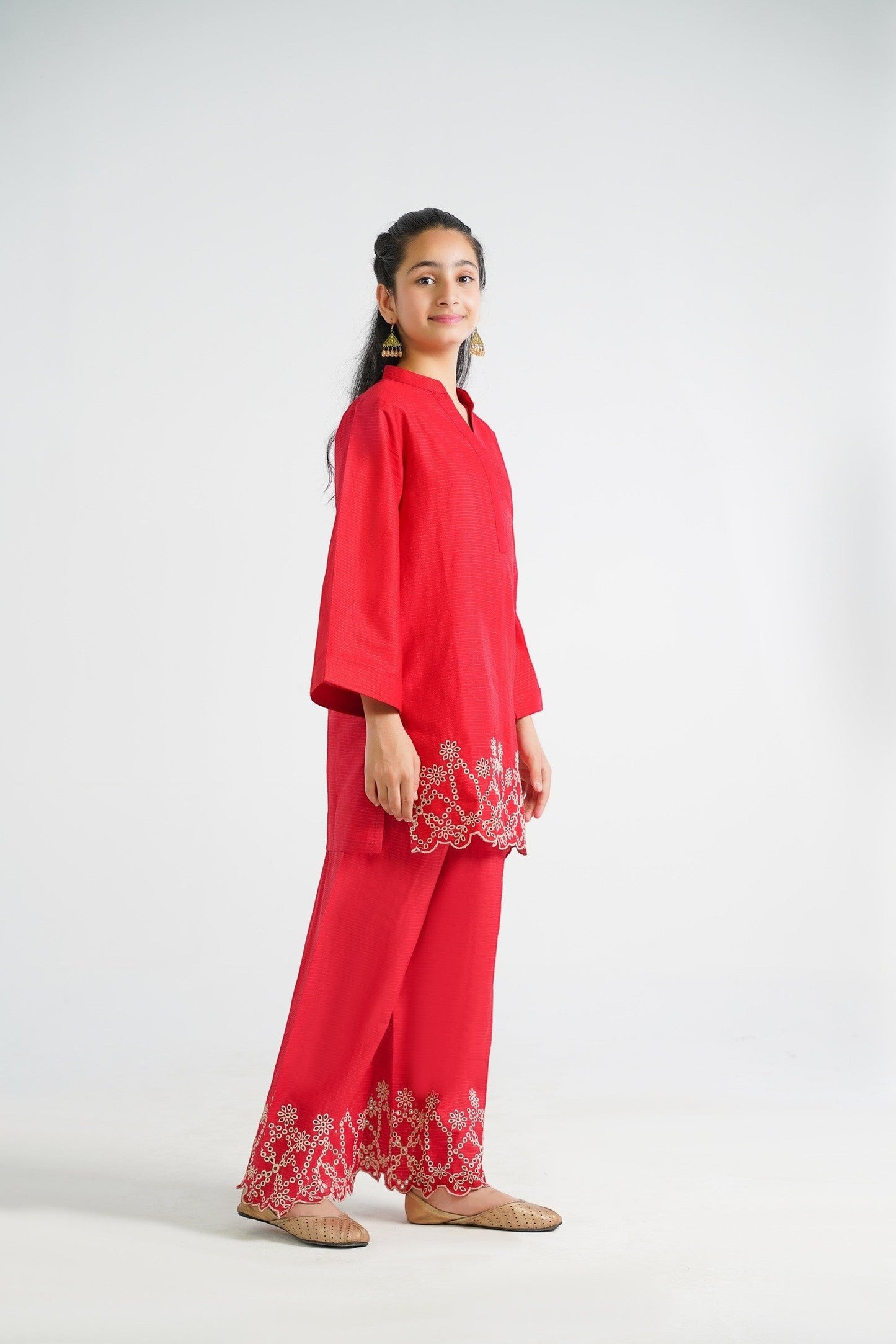 Lily red cotton kurta and palazzo set with floral embroidery on hem, V-neck, bell sleeves.
