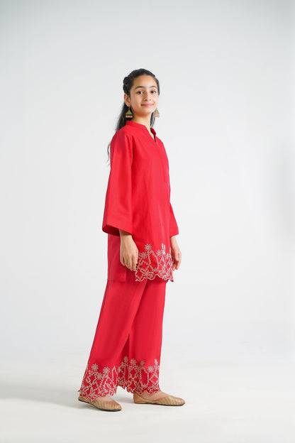 Lily red cotton kurta and palazzo set with floral embroidery on hem, V-neck, bell sleeves.